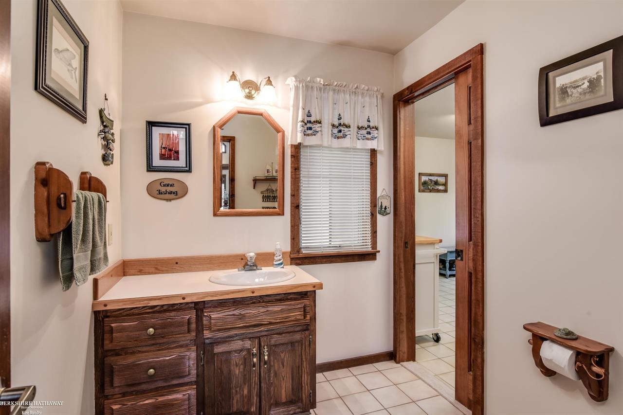32443 Sutton Road New Baltimore, MI 48047 - Photo 21 of 46 Half bath that connects to living room and laundry room