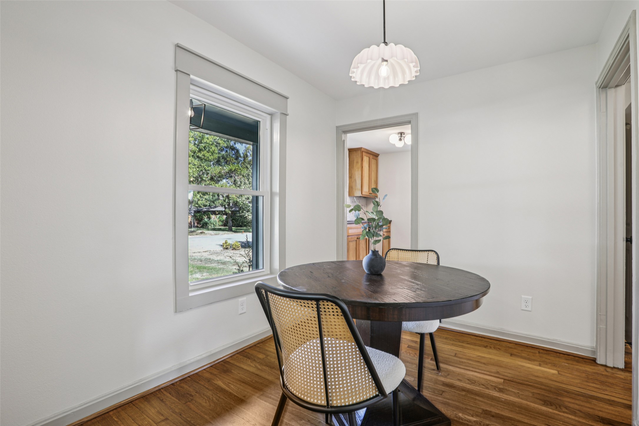602 Short Street Smithville, TX 78957 - Photo 12 of 27 a view of a dining room with furniture window and wooden floor