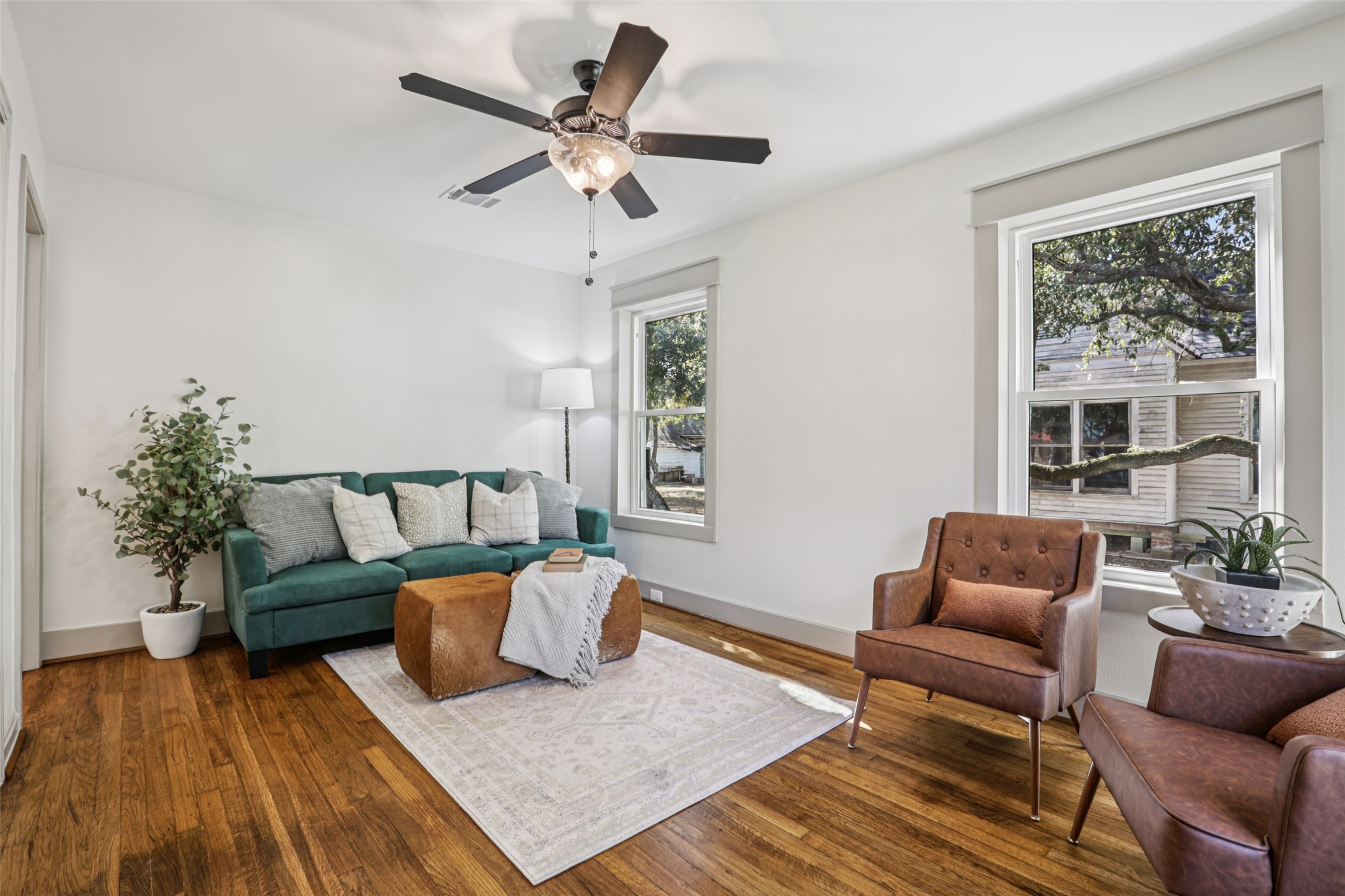 602 Short Street Smithville, TX 78957 - Photo 2 of 27 a living room with furniture and a window