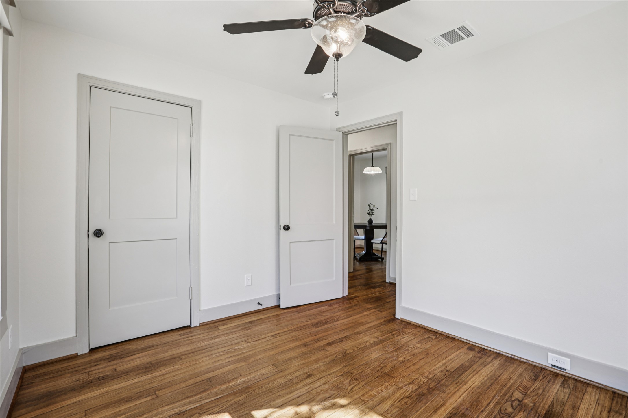 602 Short Street Smithville, TX 78957 - Photo 25 of 27 a view of an empty room and wooden floor