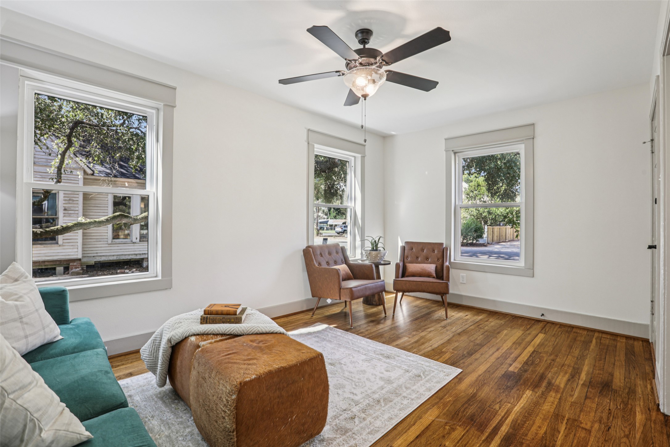 602 Short Street Smithville, TX 78957 - Photo 9 of 27 a living room with furniture and a window
