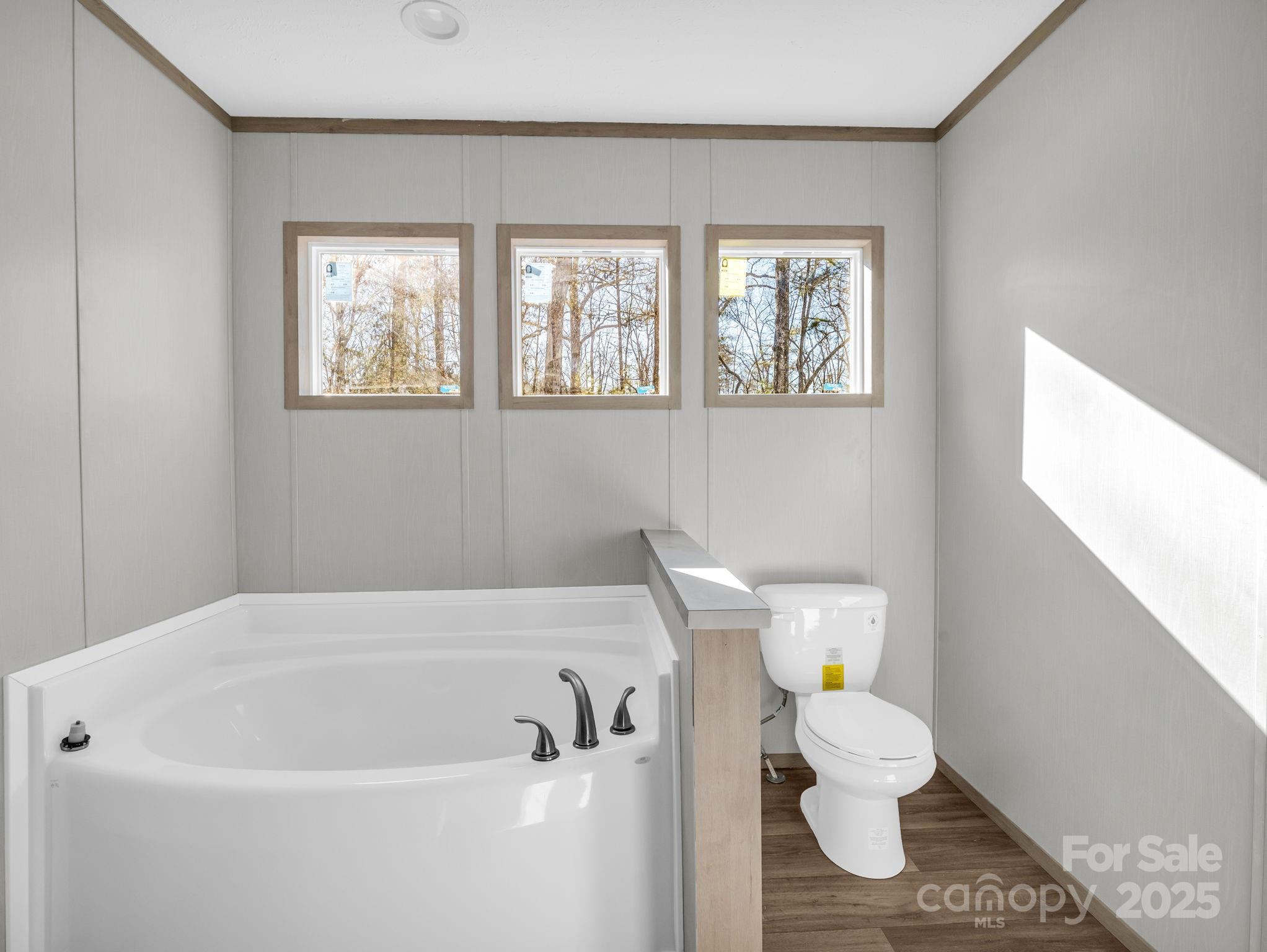 844 Tiney Road Ellenboro, NC 28040 - Photo 20 of 45 a white bath tub sitting next to a white toilet