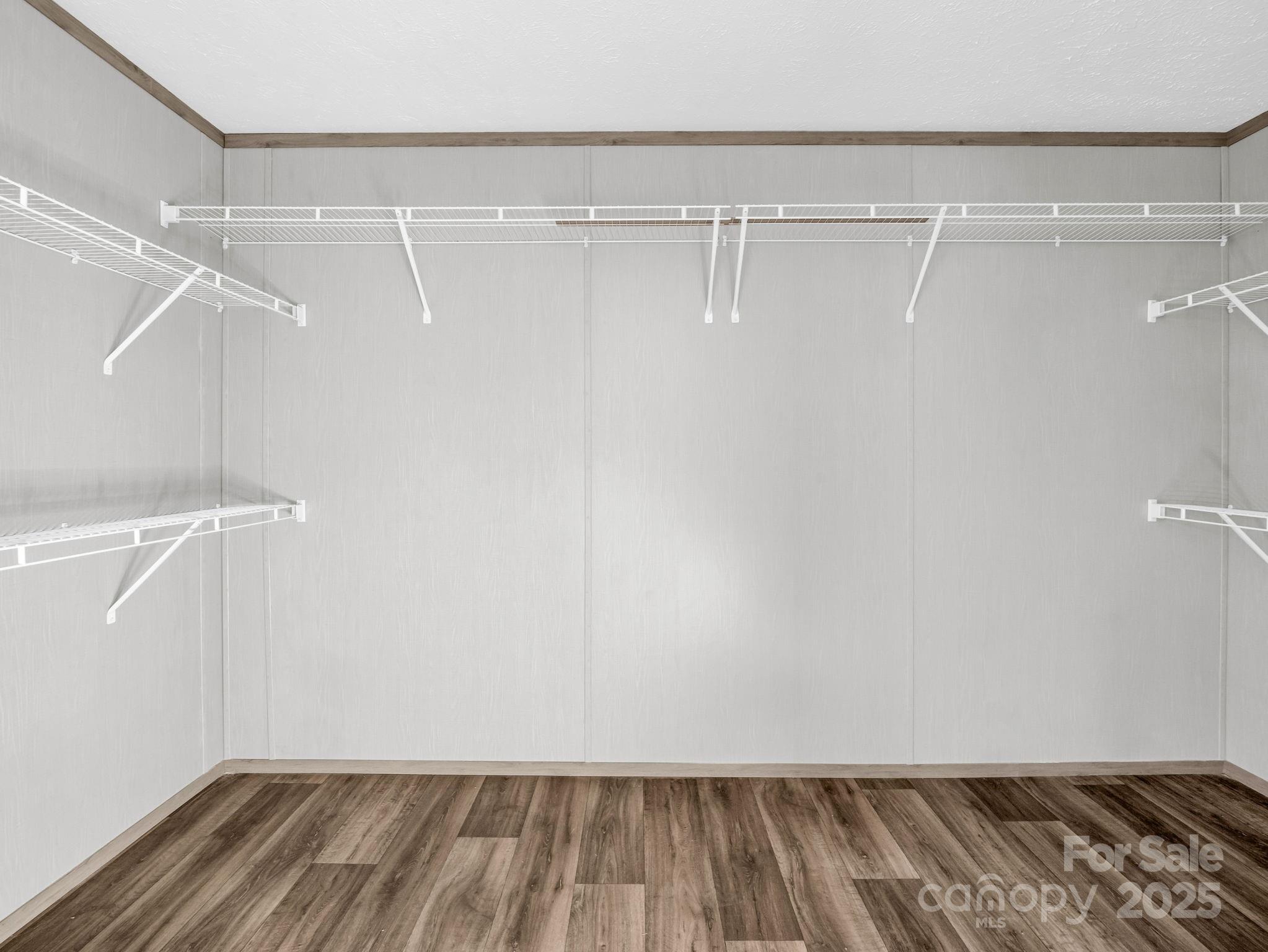 844 Tiney Road Ellenboro, NC 28040 - Photo 21 of 45 a view of a room with racks on the wall