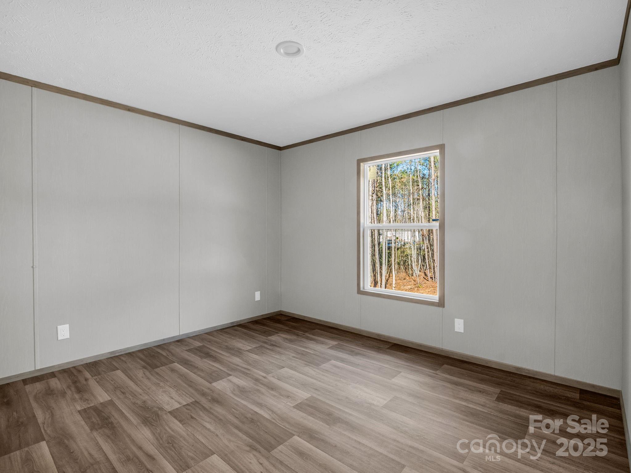 844 Tiney Road Ellenboro, NC 28040 - Photo 26 of 45 a view of an empty room with a window
