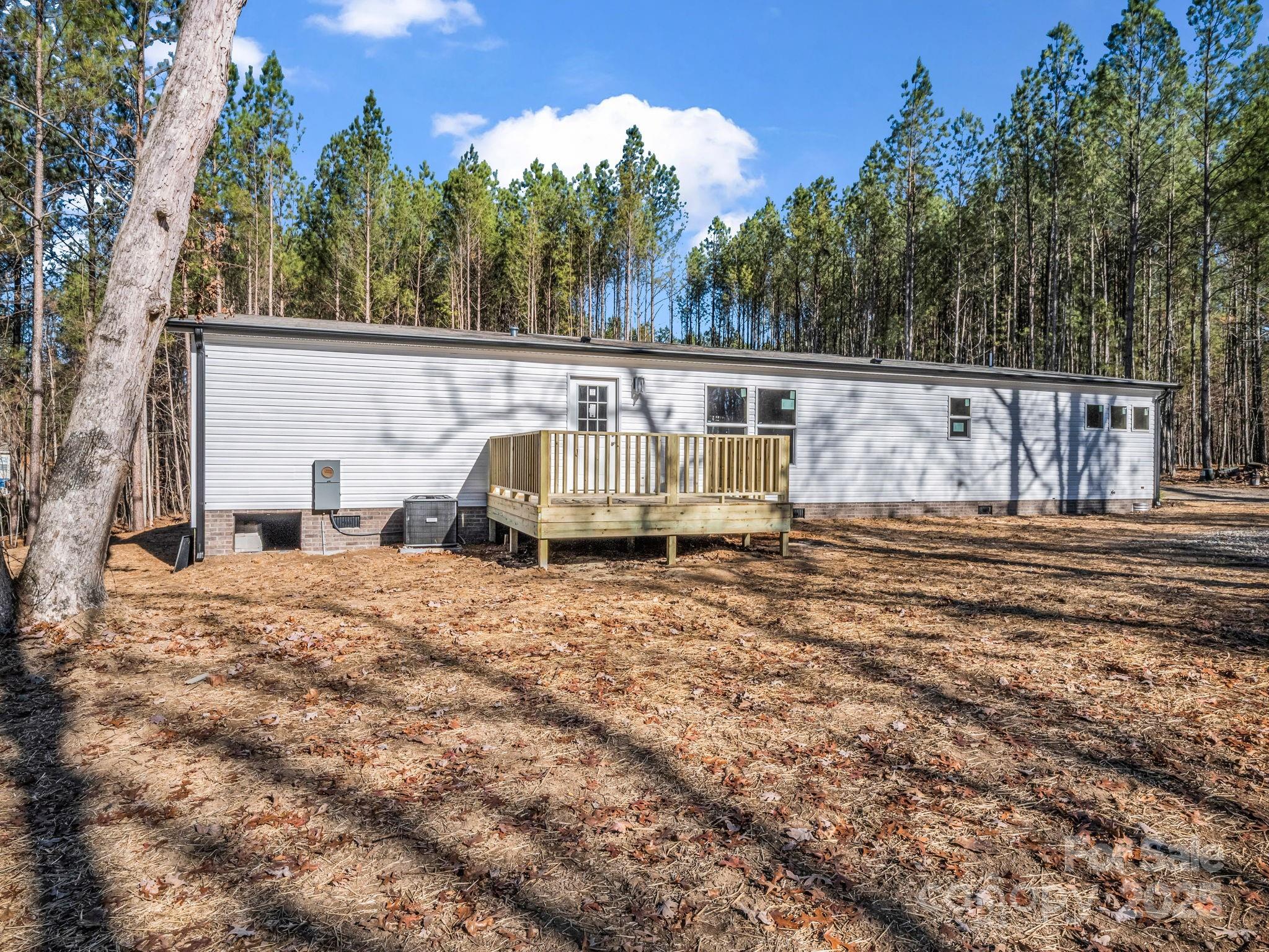 844 Tiney Road Ellenboro, NC 28040 - Photo 30 of 45 a view of a backyard of the house