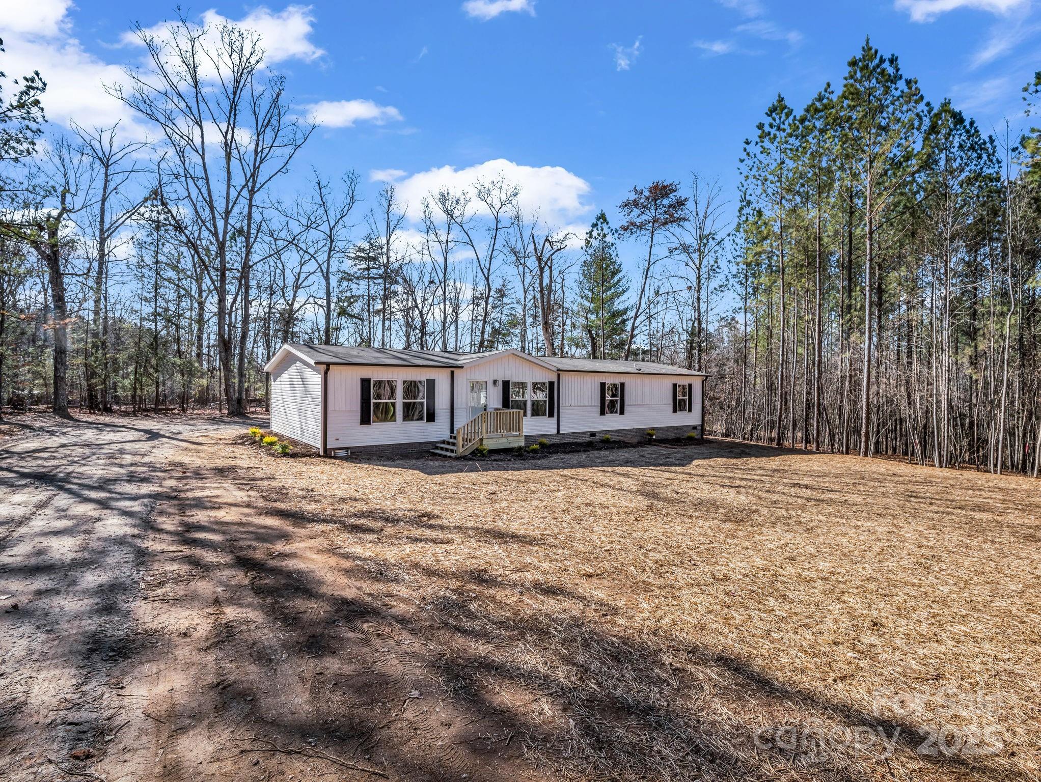844 Tiney Road Ellenboro, NC 28040 - Photo 3 of 45 a view of a house with a yard