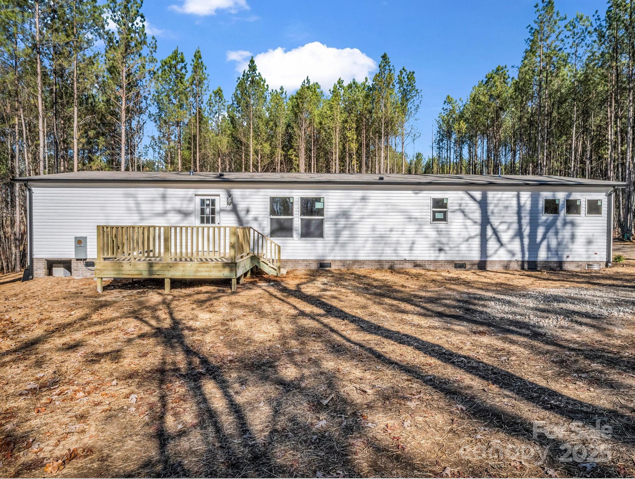 844 Tiney Road Ellenboro, NC 28040 - Photo 31 of 45 a view of a house with a yard
