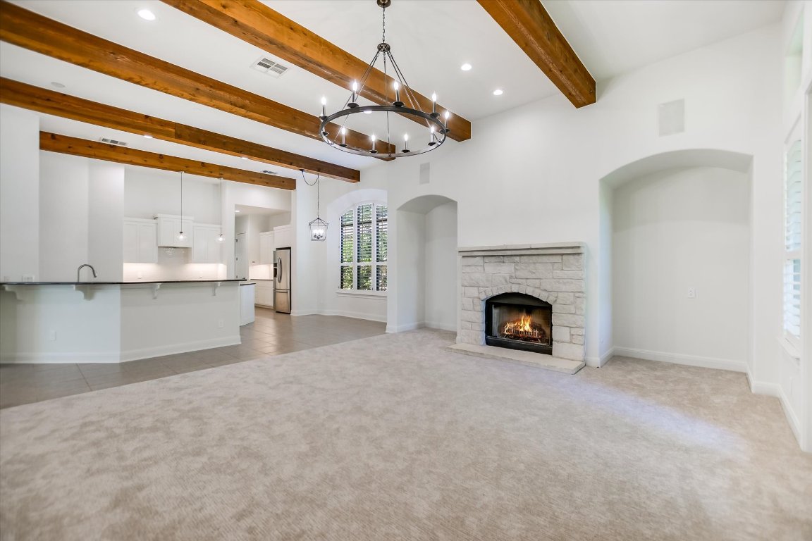 2617 University Club Drive Austin, TX 78732 - Photo 2 of 25 a view of a fireplace and window in a room