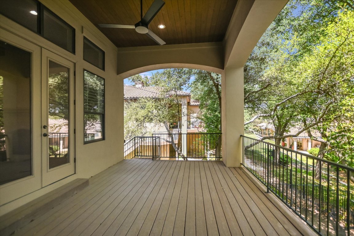 2617 University Club Drive Austin, TX 78732 - Photo 24 of 25 a view of a balcony with wooden floor