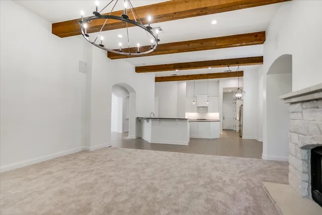 a view of a kitchen with a sink and cabinets