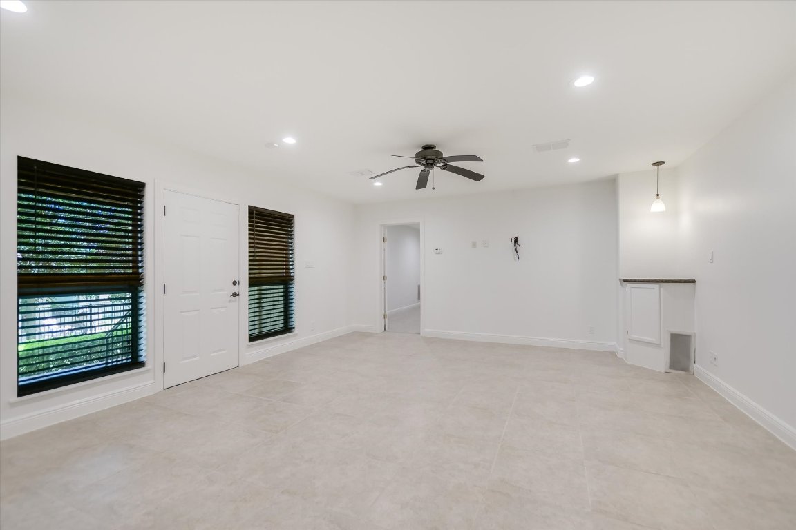 2617 University Club Drive Austin, TX 78732 - Photo 8 of 25 a view of an empty room with a fireplace
