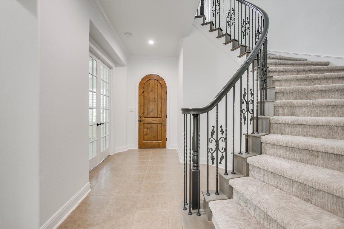 2617 University Club Drive Austin, TX 78732 - Photo 9 of 25 a view of entryway and hall with wooden floor