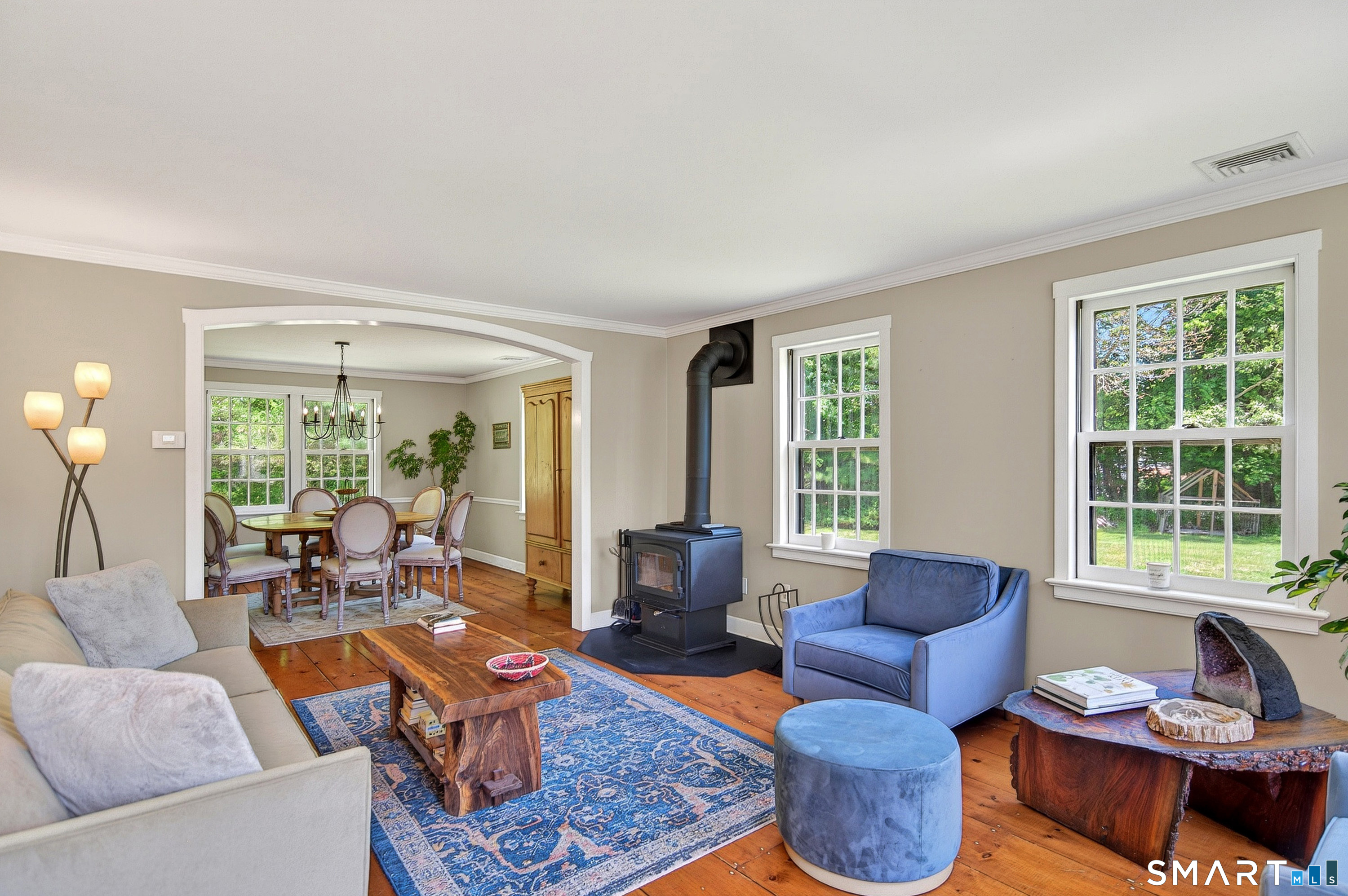 174 Huntingtown Road Newtown, CT 06470 - Photo 6 of 40 a living room with furniture and a large window