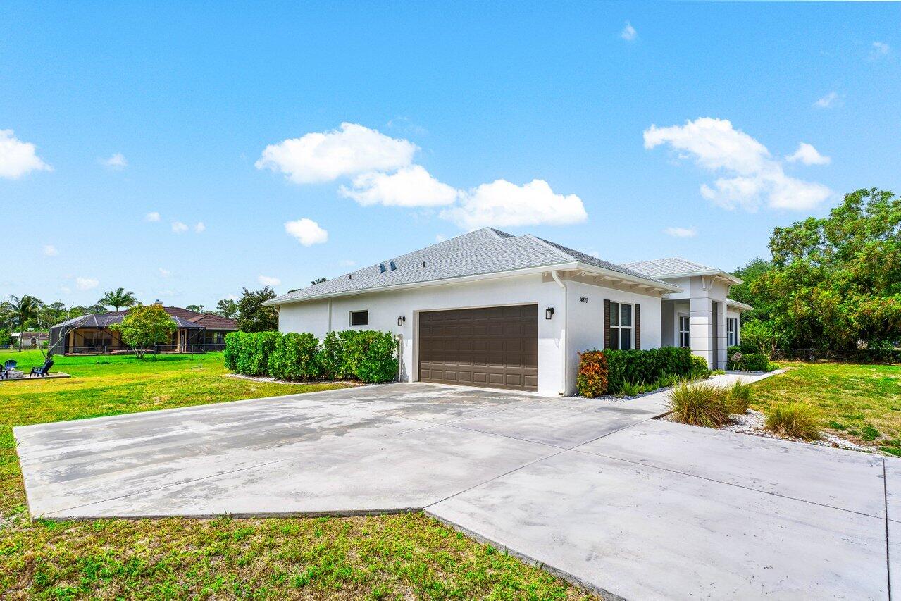 14570 85th Road North The Acreage, FL 33470 - Photo 4 of 48 006-1457085thRoadNorth-Westlake-FL-33470