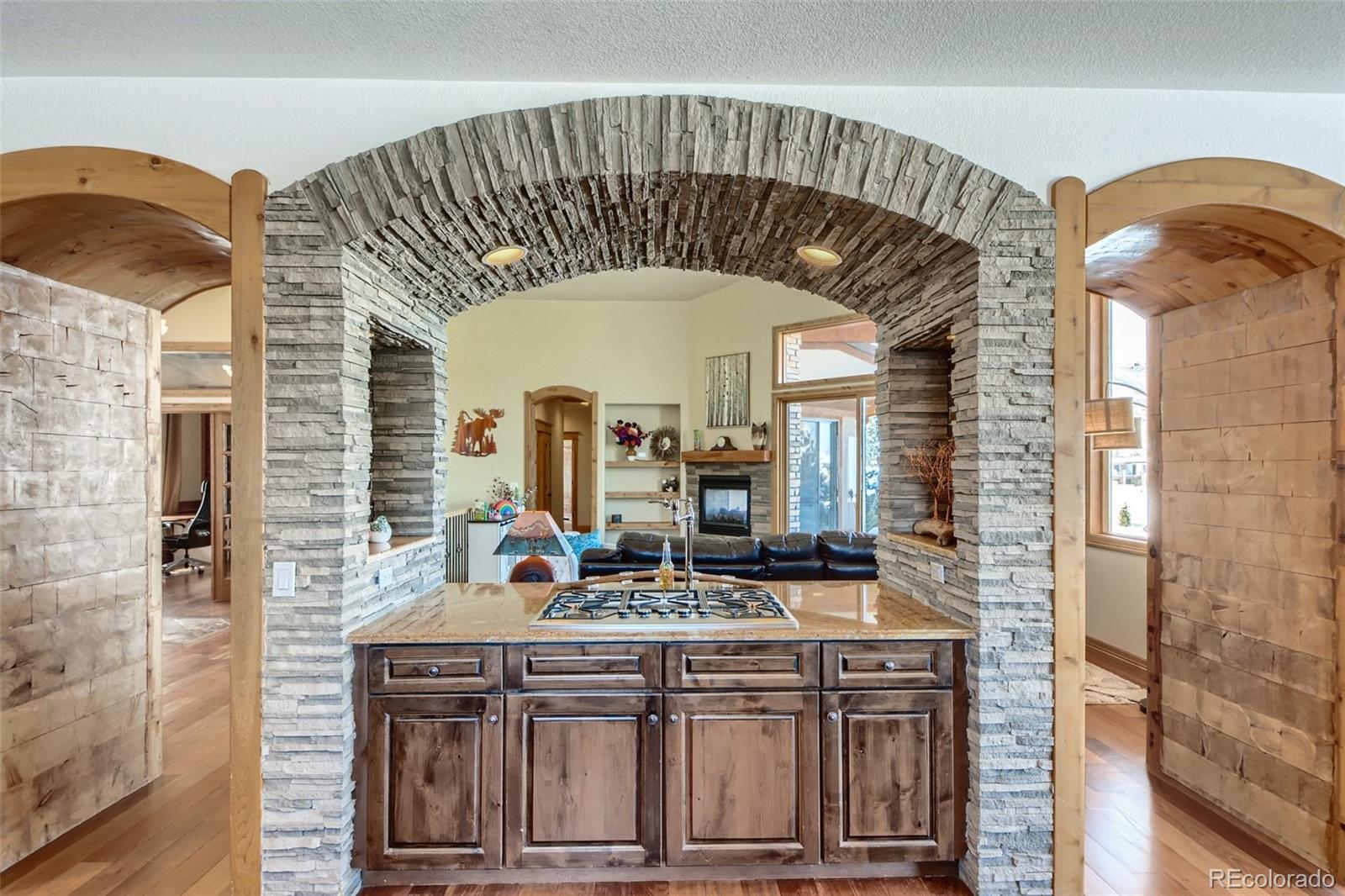 11227 Explorers Run Littleton, CO 80125 - Photo 11 of 33 a view of hall way with furniture