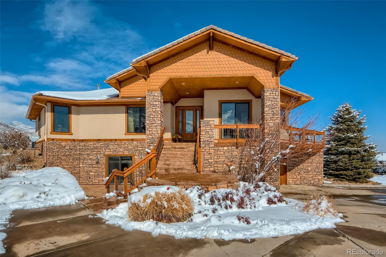 11227 Explorers Run Littleton, CO 80125 - Photo 2 of 33 a front view of a house