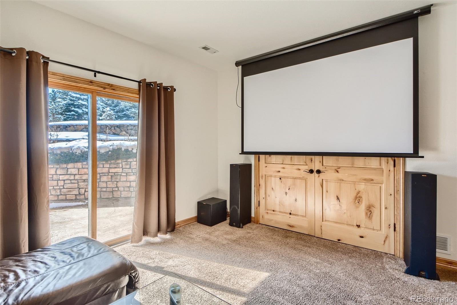 11227 Explorers Run Littleton, CO 80125 - Photo 26 of 33 a bedroom with a bed and a window