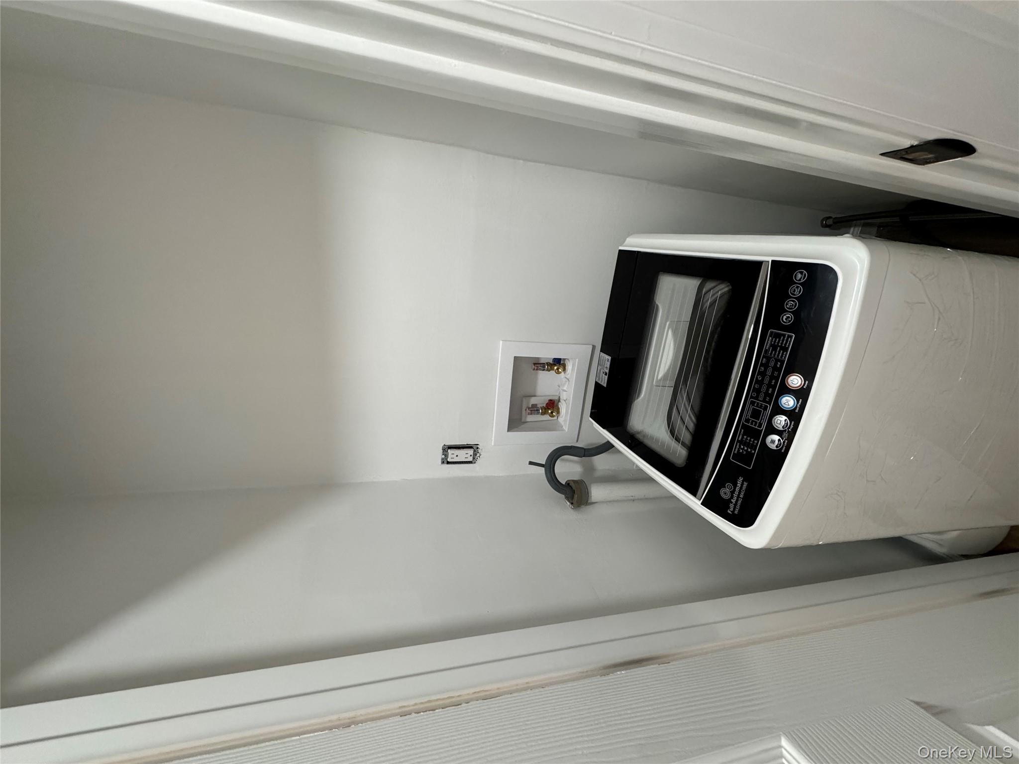 2449 I Union Avenue, Unit 34A Islip, NY 11751 - Photo 15 of 19 a close up view of washer and dryer