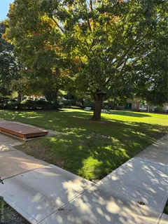 a view of a golf course with a lake