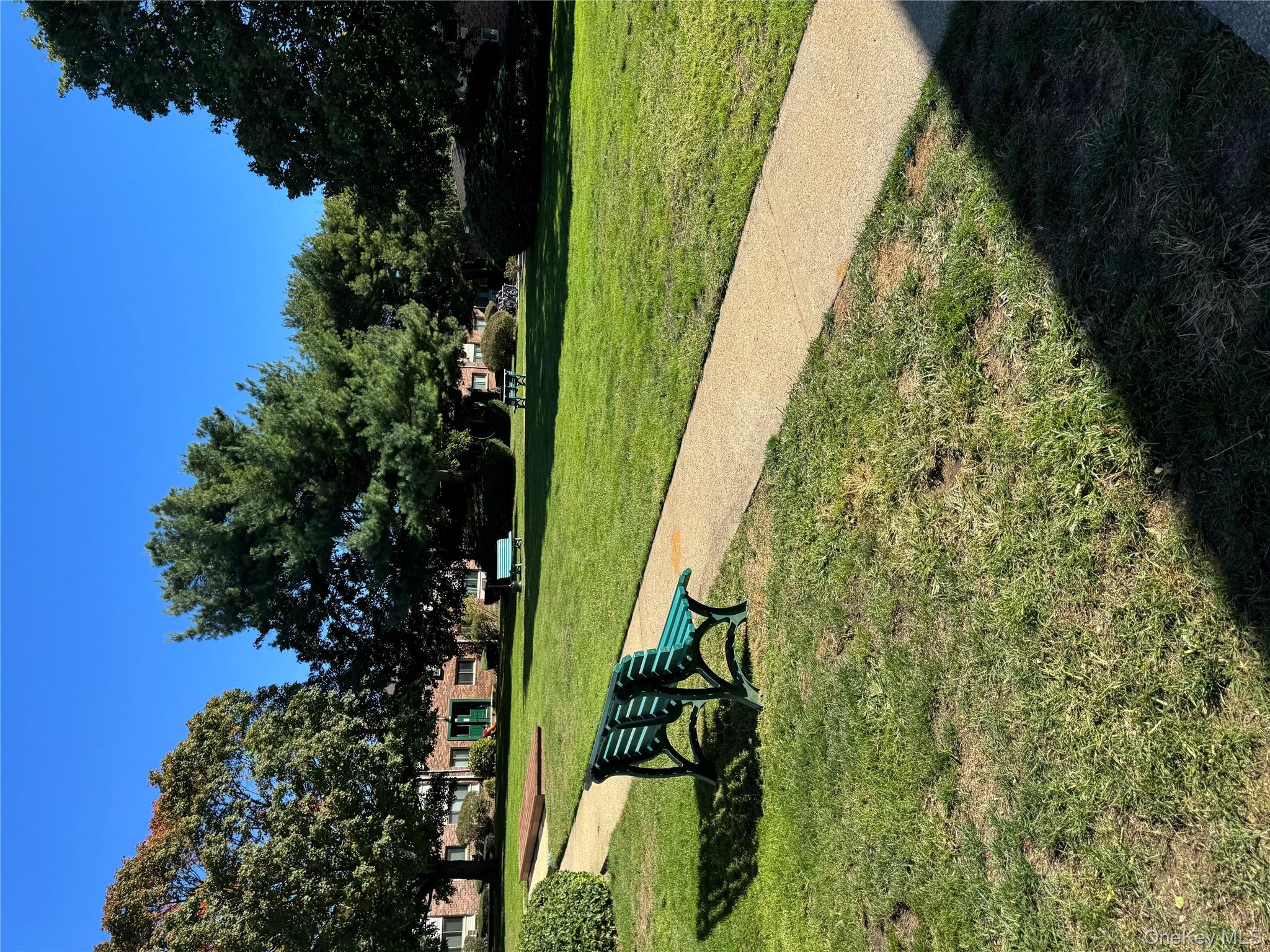 2449 I Union Avenue, Unit 34A Islip, NY 11751 - Photo 17 of 19 a view of a park with large trees