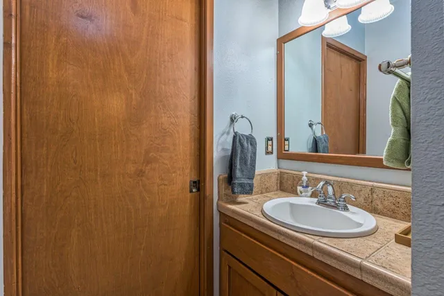 a balcony view with a wooden floor