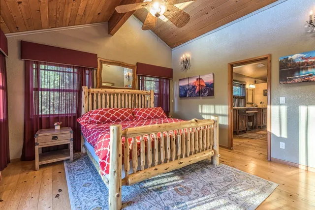 a view of a hallway with a bed