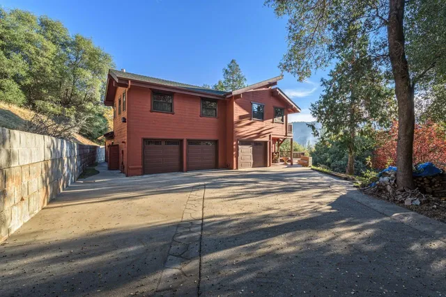 a view of a house with a street