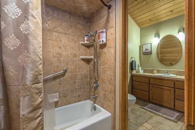 a bathroom with a toilet and a sink