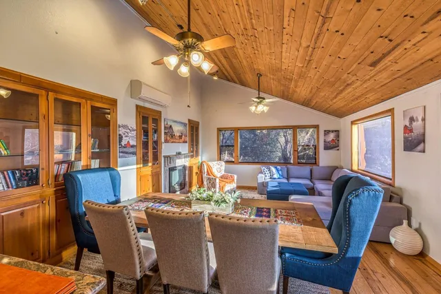 a living room with a couch and a fireplace