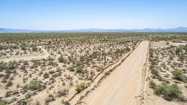 a close up of a white wall with a large window
