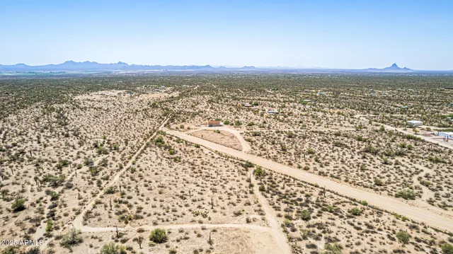 a view of a city and a mountain