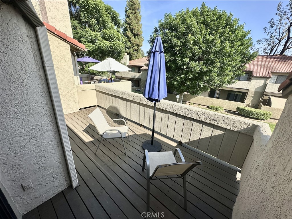 10151 Arrow, Unit 6 Rancho Cucamonga, CA 91730 - Photo 11 of 19 a balcony with chairs