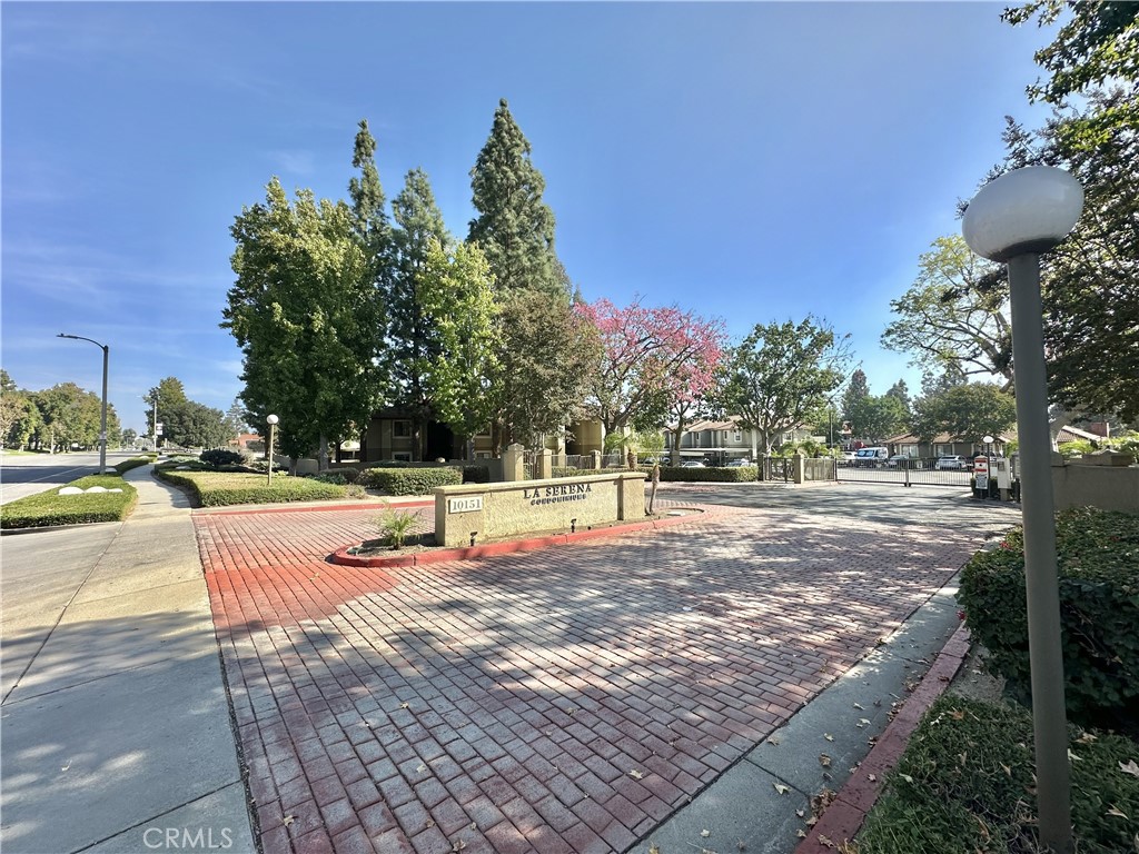 10151 Arrow, Unit 6 Rancho Cucamonga, CA 91730 - Photo 19 of 19 a view of a park with swings and slides