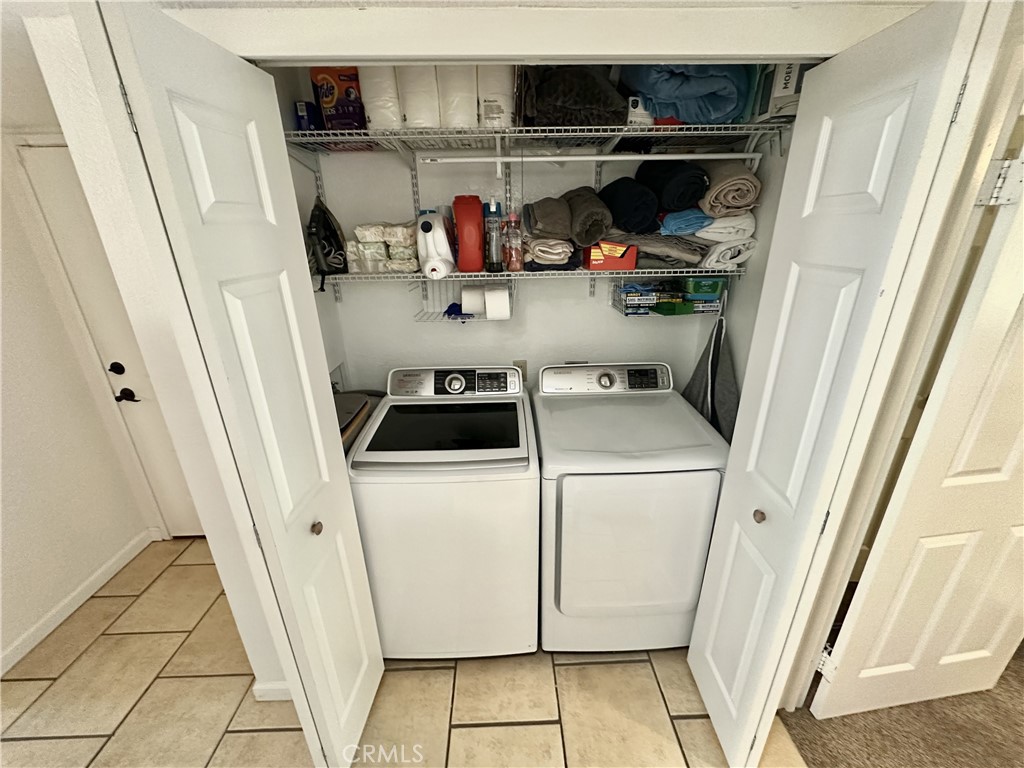 10151 Arrow, Unit 6 Rancho Cucamonga, CA 91730 - Photo 7 of 19 a utility room with dryer and washer