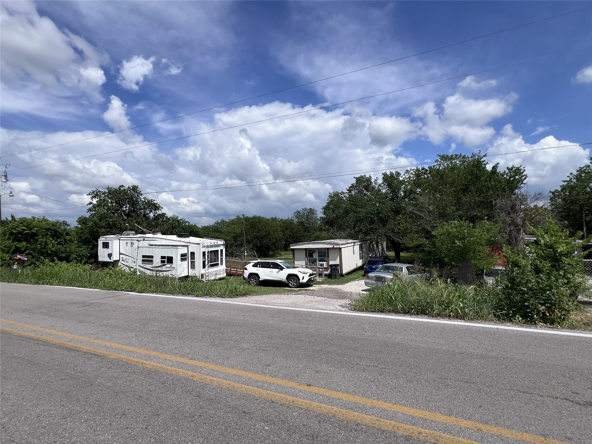 10001 Peterson Road Del Valle, TX 78617 - Photo 28 of 29 a view of street with cars
