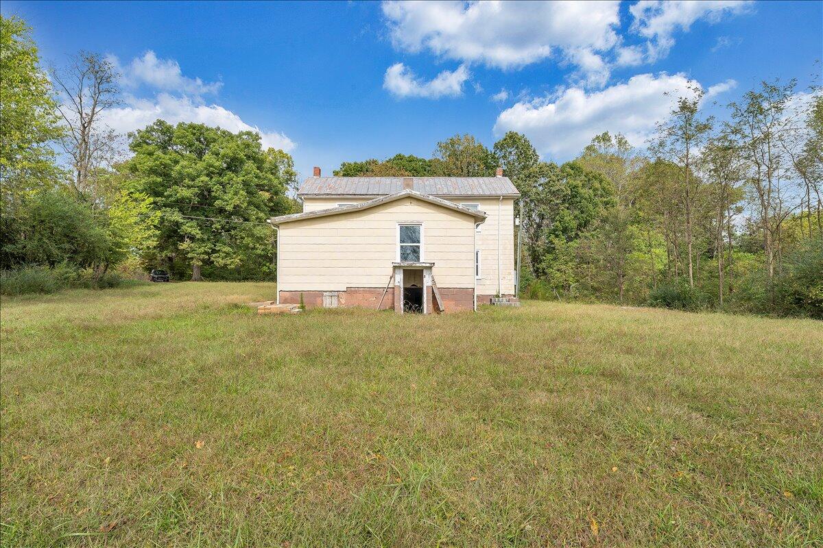 104 Claytor Road Brookneal, VA 24528 - Photo 19 of 43 a view of a house with a yard