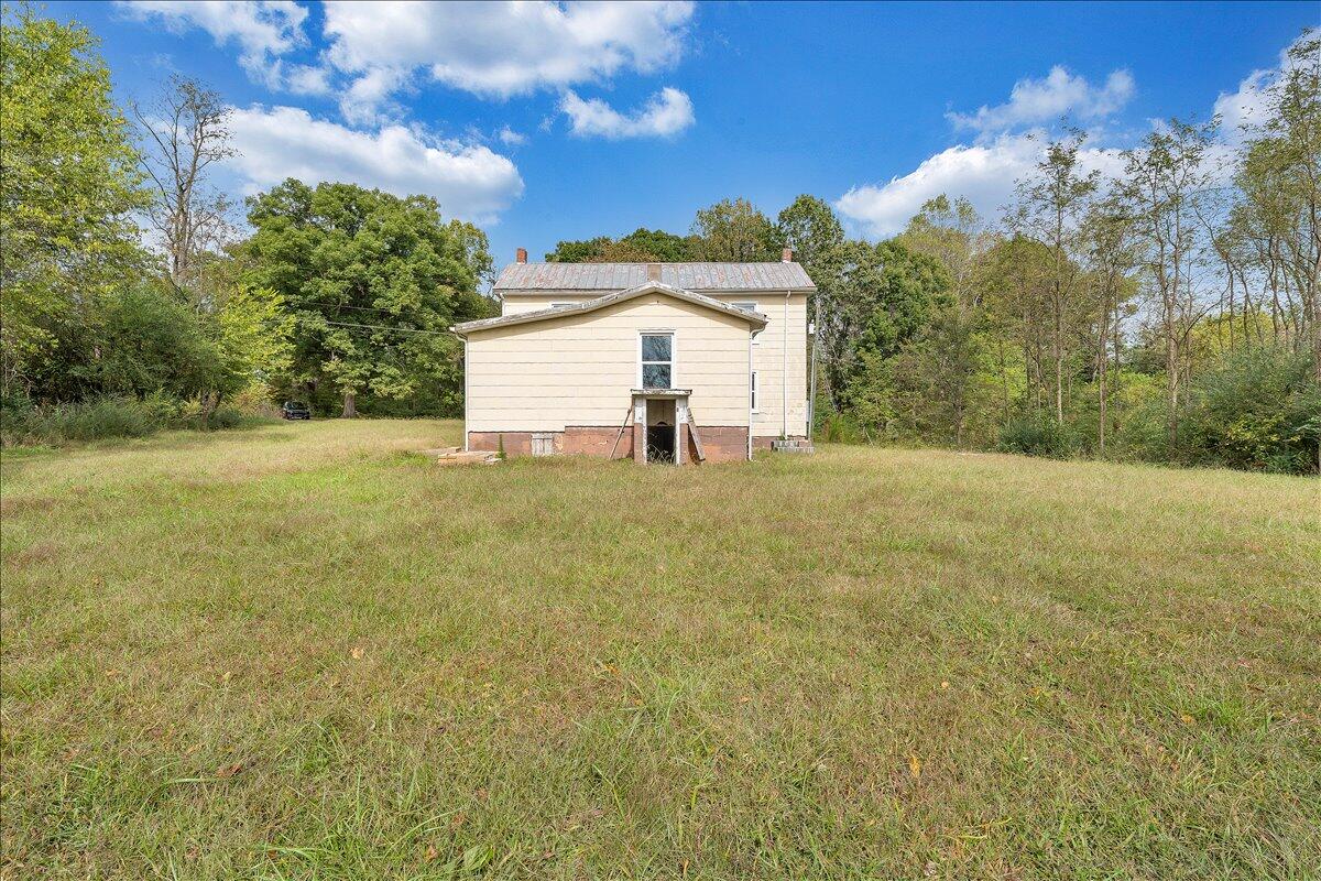 104 Claytor Road Brookneal, VA 24528 - Photo 20 of 43 a view of a big yard with an outdoor and seating space
