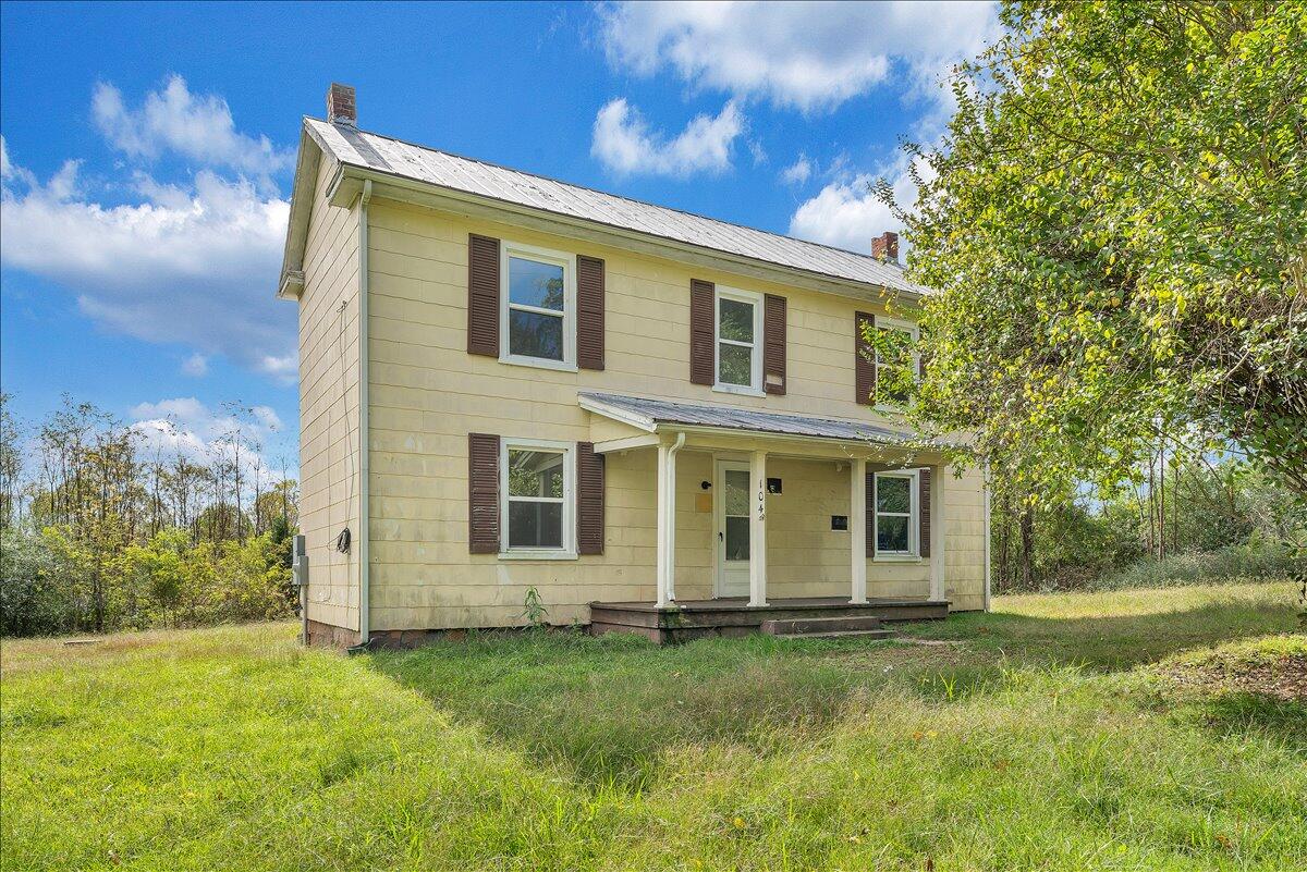 104 Claytor Road Brookneal, VA 24528 - Photo 2 of 43 a view of a house with a backyard