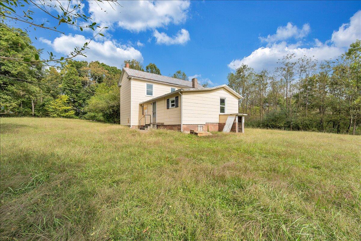 104 Claytor Road Brookneal, VA 24528 - Photo 27 of 43 a view of a house with a yard