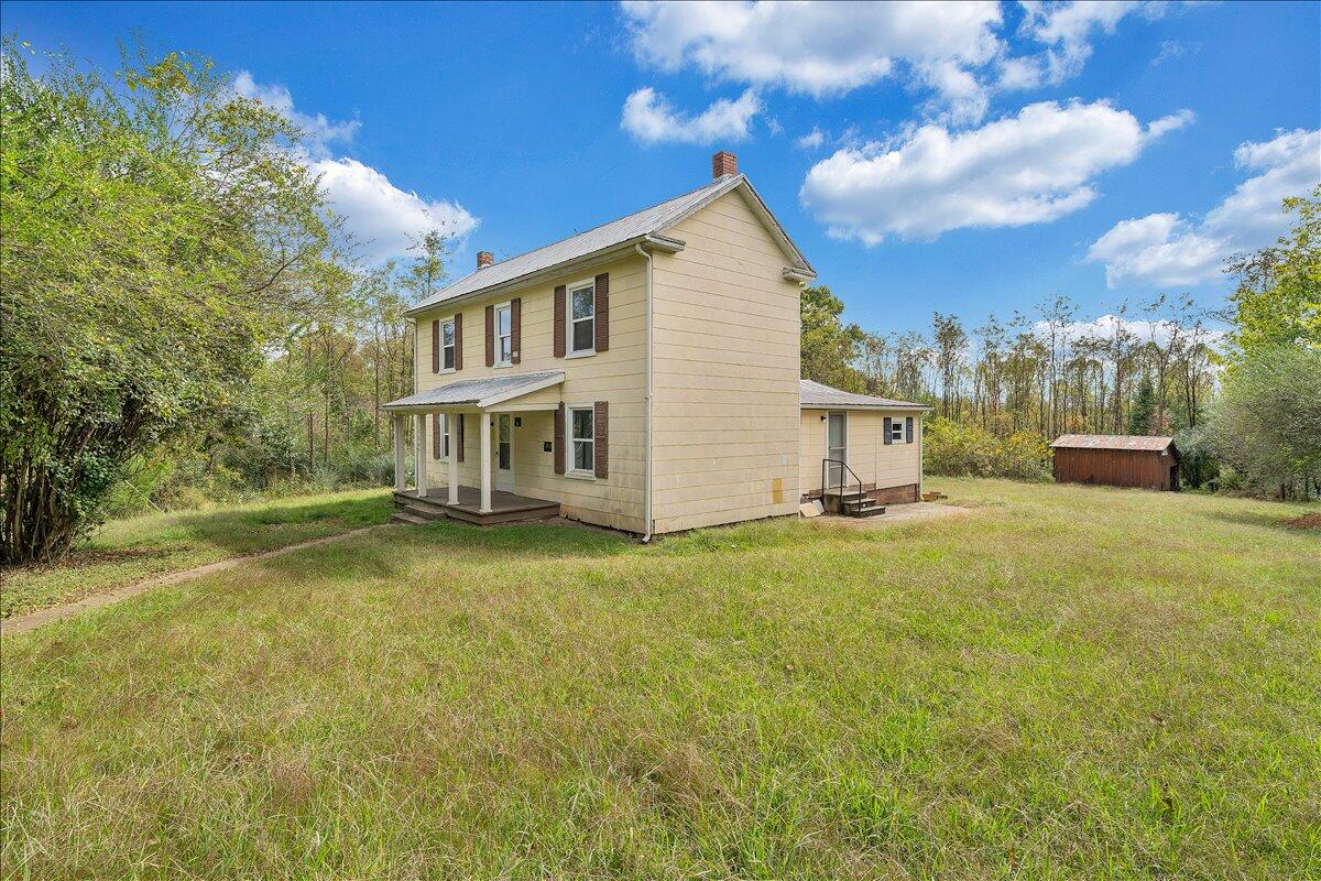 104 Claytor Road Brookneal, VA 24528 - Photo 29 of 43 a view of a house with a yard and sitting area
