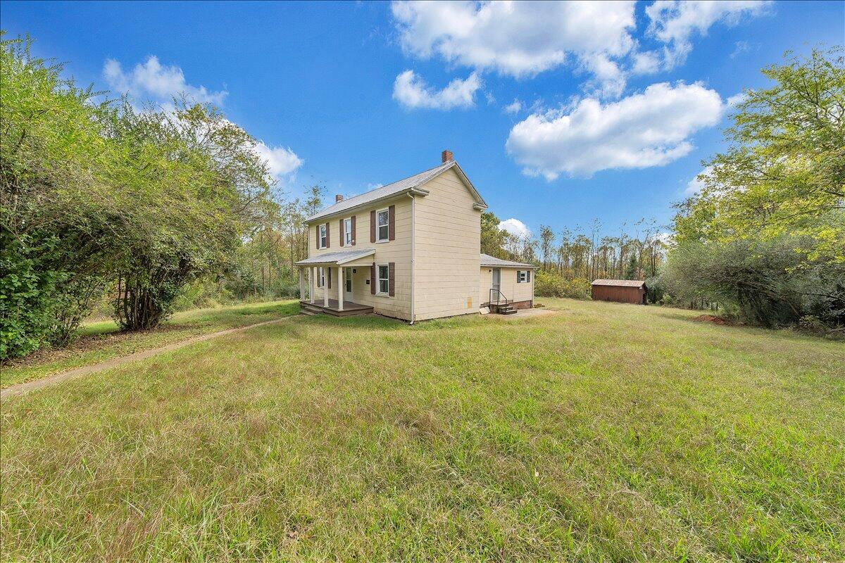 104 Claytor Road Brookneal, VA 24528 - Photo 31 of 43 a view of a house with a yard
