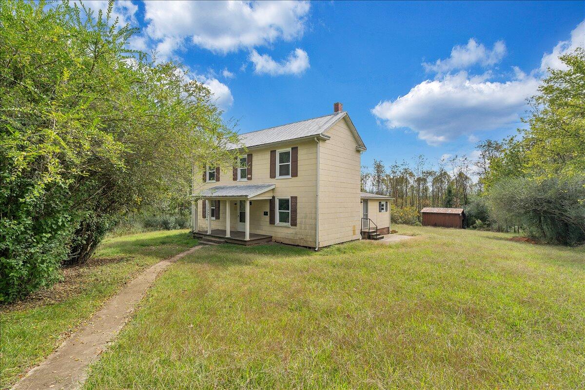 104 Claytor Road Brookneal, VA 24528 - Photo 33 of 43 a view of a house with pool and yard