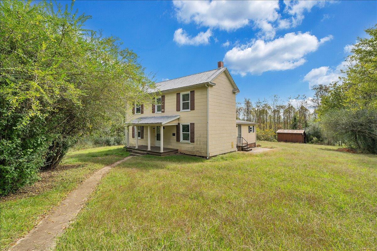 104 Claytor Road Brookneal, VA 24528 - Photo 34 of 43 a view of a house with pool and chairs