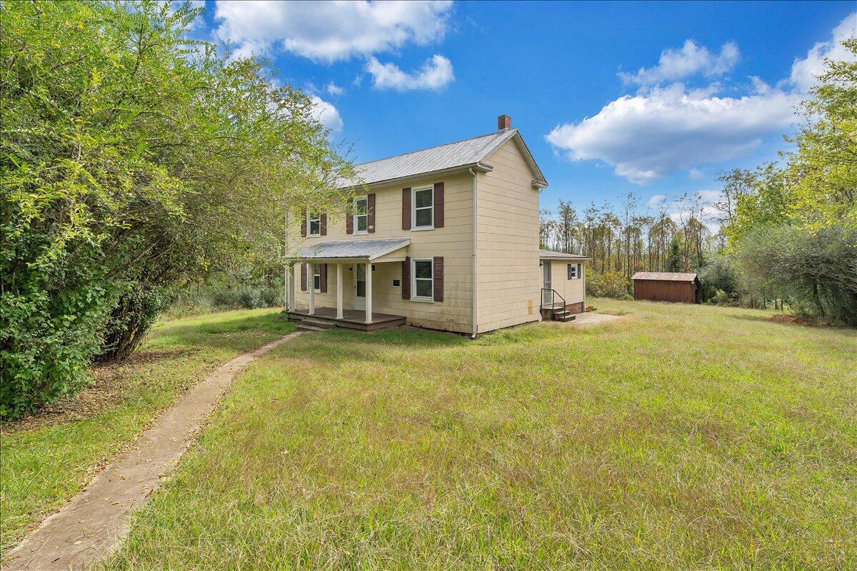 104 Claytor Road Brookneal, VA 24528 - Photo 35 of 43 a view of a house with a yard