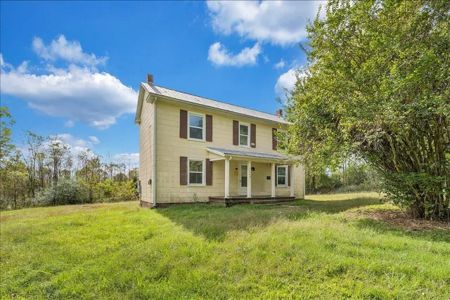 a view of a house with a big yard