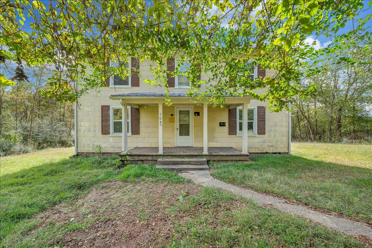 104 Claytor Road Brookneal, VA 24528 - Photo 43 of 43 a front view of a house with garden