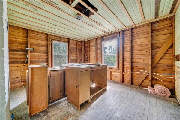 a view of an empty room and window