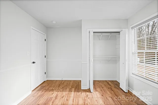 a utility room with cabinets