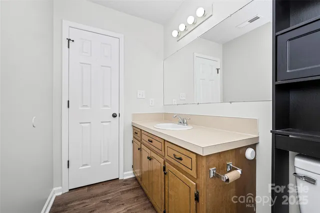 a bathroom with a toilet a sink and bathtub