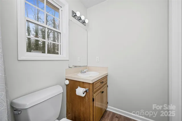 a bathroom with a toilet and a bathtub